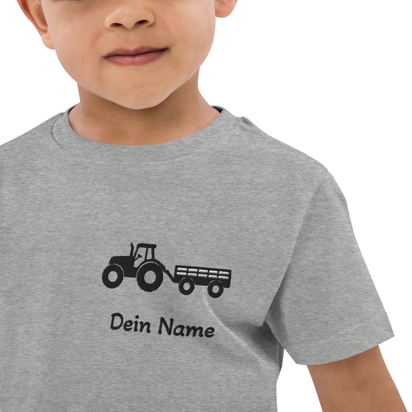 Traktor mit Anhänger auf Bio-Baumwoll-T-Shirt für Kinder gestickt Personalisierbar